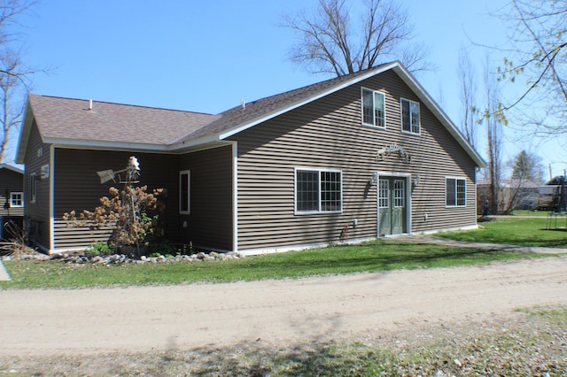 36282 Rush Lake Loop Unit 29A, Ottertail, MN 56571 - view of front of house with a shingled roof and a front yard