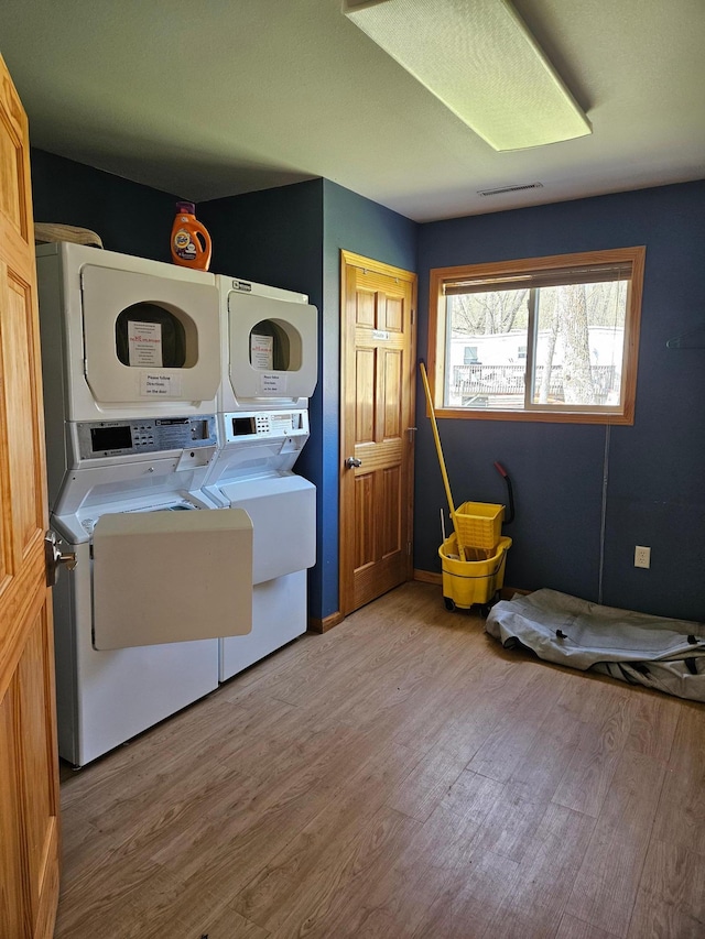 36282 Rush Lake Loop Unit 29A, Ottertail, MN 56571 - laundry room with wood finished floors and washer and clothes dryer