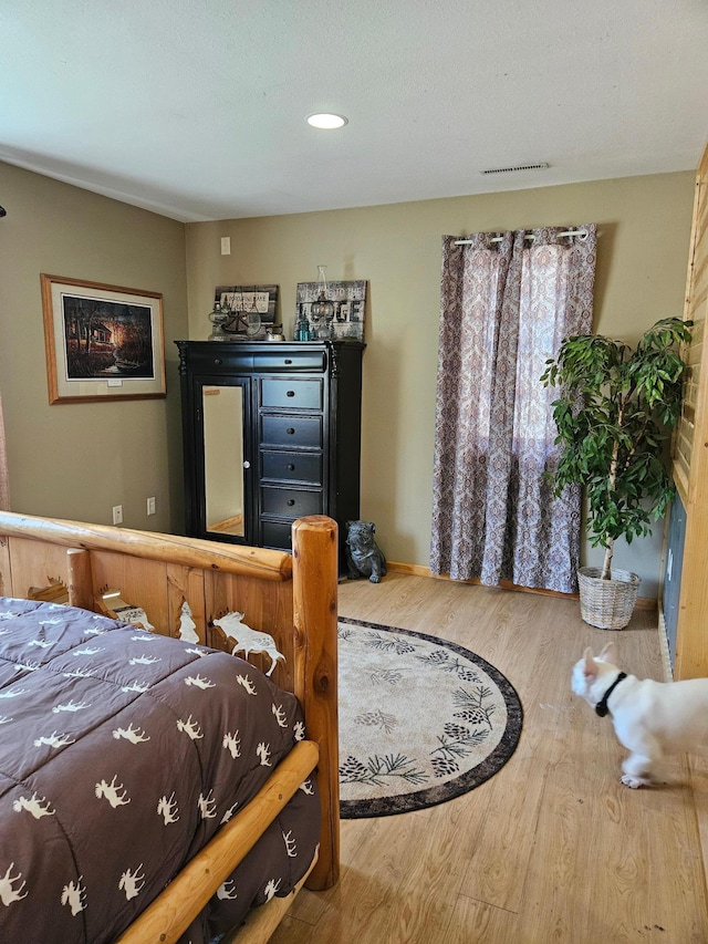 36282 Rush Lake Loop Unit 29A, Ottertail, MN 56571 - bedroom with wood finished floors, baseboards, and recessed lighting