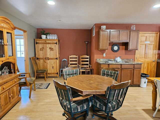 36282 Rush Lake Loop Unit 29A, Ottertail, MN 56571 - dining space featuring light wood-type flooring and recessed lighting