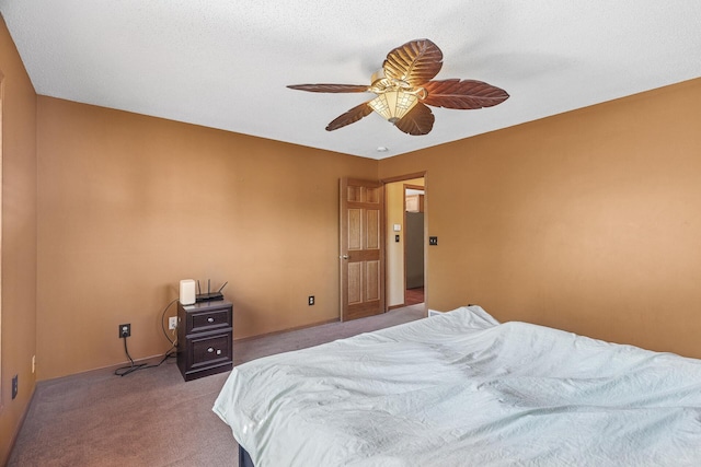 bedroom featuring light colored carpet and ceiling fan