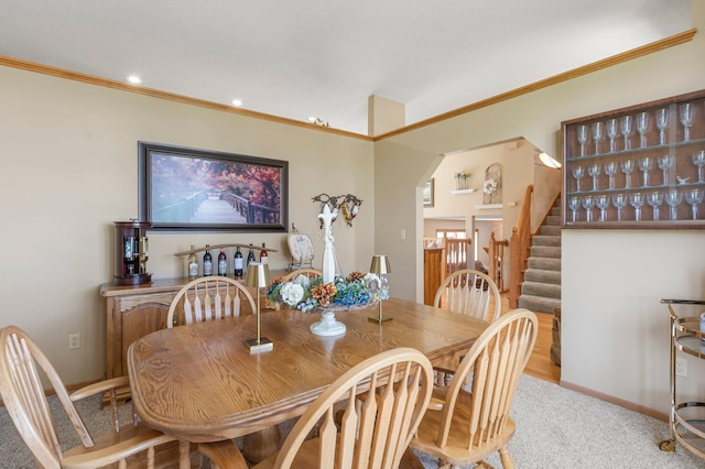 1282 141st Ln NW, Andover, MN 55304 - dining area featuring stairs, crown molding, carpet floors, arched walkways, and recessed lighting