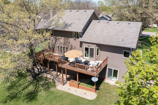 1282 141st Ln NW, Andover, MN 55304 - rear view of property with a deck, a lawn, and roof with shingles