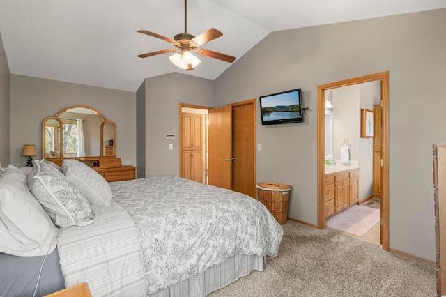 1282 141st Ln NW, Andover, MN 55304 - bedroom with vaulted ceiling, light colored carpet, connected bathroom, and a ceiling fan