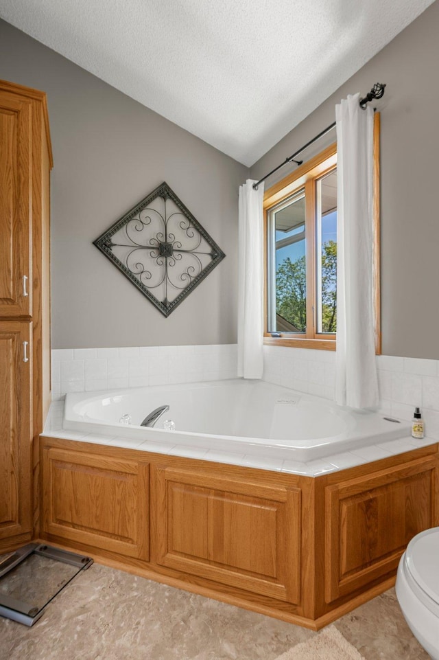 1282 141st Ln NW, Andover, MN 55304 - full bath featuring a bath and a textured ceiling
