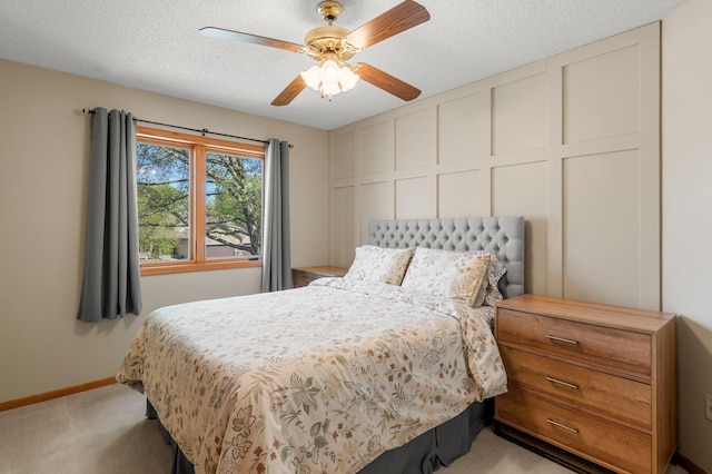 1282 141st Ln NW, Andover, MN 55304 - bedroom featuring light colored carpet, a textured ceiling, and a ceiling fan