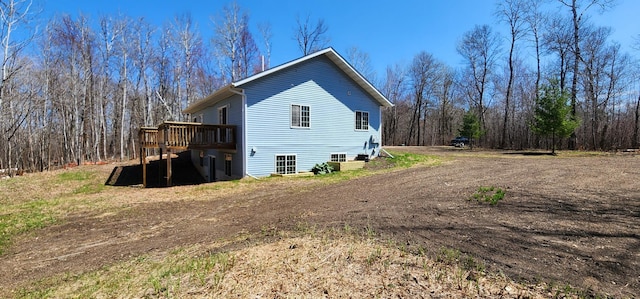 view of home's exterior with a deck