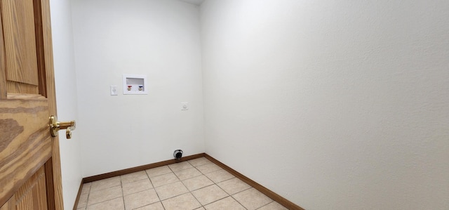laundry room featuring light tile patterned floors, baseboards, washer hookup, laundry area, and electric dryer hookup