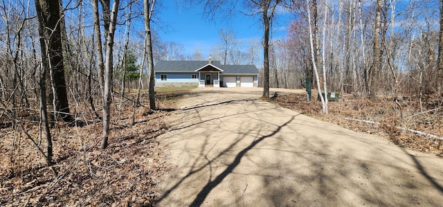 view of front of house with a garage and driveway