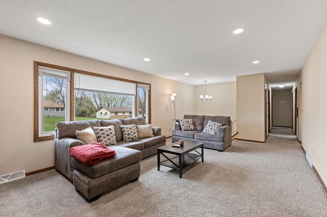 2409 Highland View Ave S, Burnsville, MN 55337 - living area with light colored carpet, a chandelier, recessed lighting, and baseboards