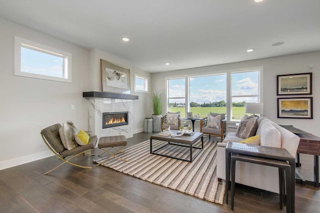 10833 38th Trl N, Lake Elmo, MN 55042 - living room featuring a high end fireplace, recessed lighting, wood finished floors, and baseboards