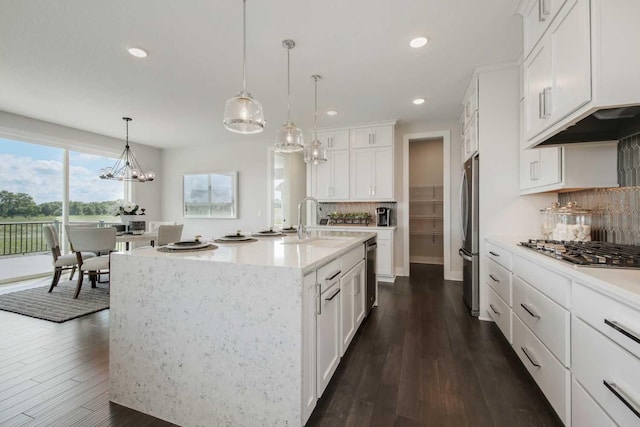 10833 38th Trl N, Lake Elmo, MN 55042 - kitchen featuring a sink, appliances with stainless steel finishes, recessed lighting, decorative backsplash, and white cabinets