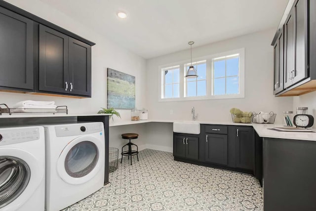 10833 38th Trl N, Lake Elmo, MN 55042 - laundry area featuring cabinet space, washing machine and clothes dryer, recessed lighting, baseboards, and light flooring