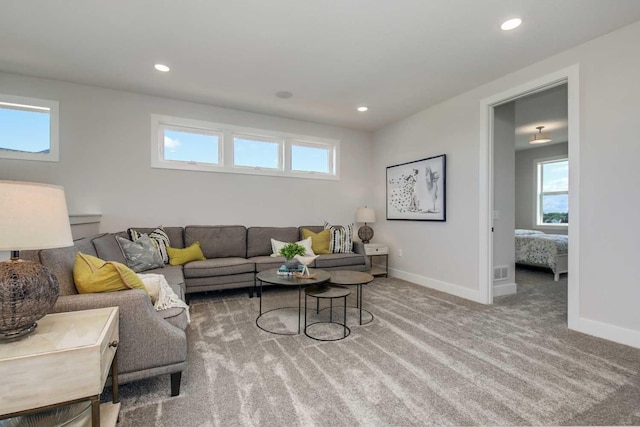 10833 38th Trl N, Lake Elmo, MN 55042 - carpeted living room with baseboards and recessed lighting
