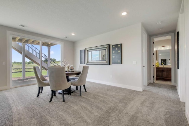 10833 38th Trl N, Lake Elmo, MN 55042 - dining room featuring carpet flooring, baseboards, and recessed lighting