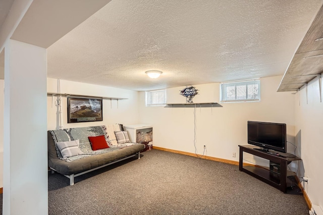 living room with a textured ceiling, carpet, and baseboards