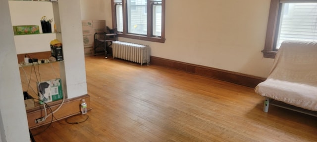 3229 Chicago Ave, Minneapolis, MN 55407 - sitting room with radiator and wood finished floors