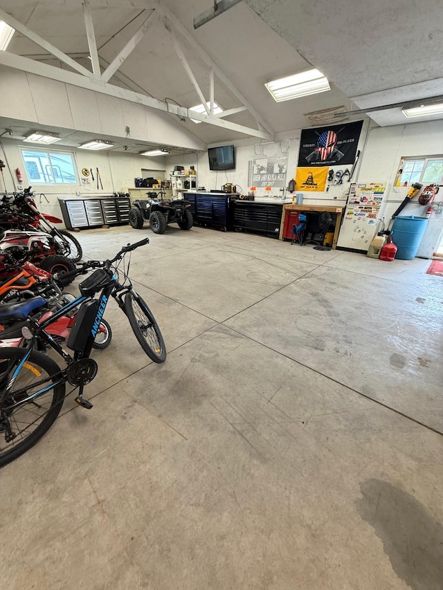 garage with a workshop area