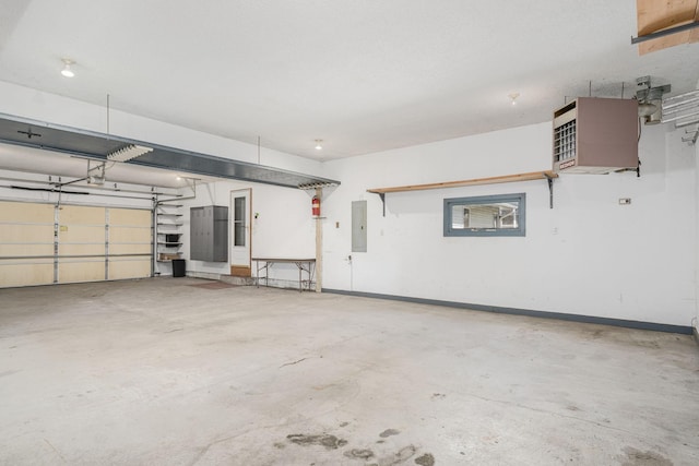 4416 Louisiana Ave N, Crystal, MN 55428 - garage featuring electric panel, baseboards, and a heating unit