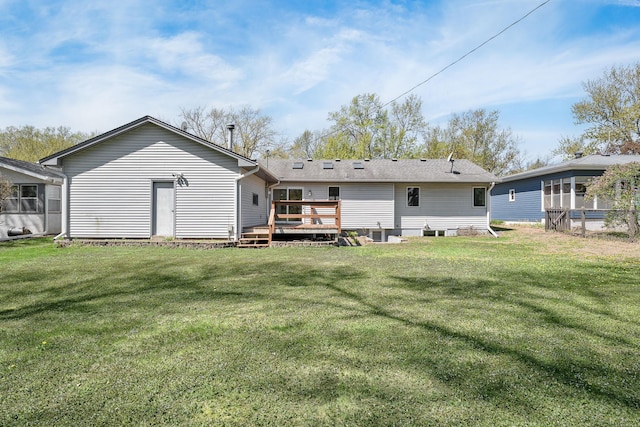4416 Louisiana Ave N, Crystal, MN 55428 - back of property with a wooden deck and a yard