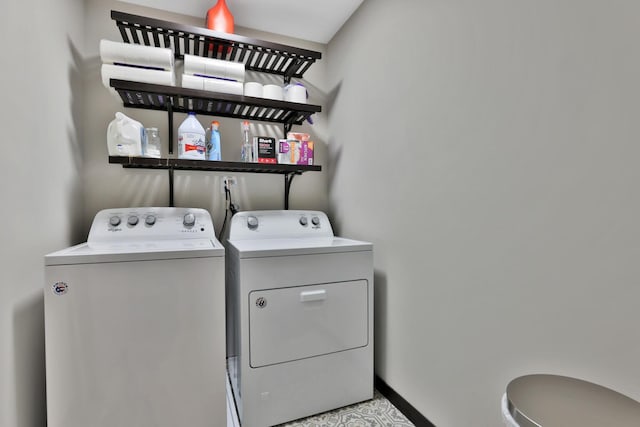 10240 3rd St NE Unit D, Blaine, MN 55434 - washroom featuring washing machine and dryer and baseboards