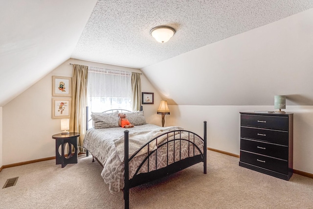 1103 Park Ln SE, New Prague, MN 56071 - bedroom with light colored carpet, lofted ceiling, and baseboards