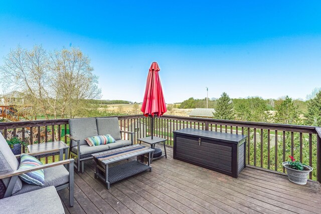 1103 Park Ln SE, New Prague, MN 56071 - wooden deck with an outdoor living space