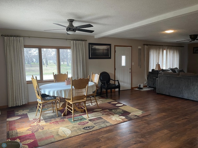 101 Oak St, Lisbon, ND 58054 - dining space with ceiling fan, a textured ceiling, plenty of natural light, wood finished floors, and beamed ceiling