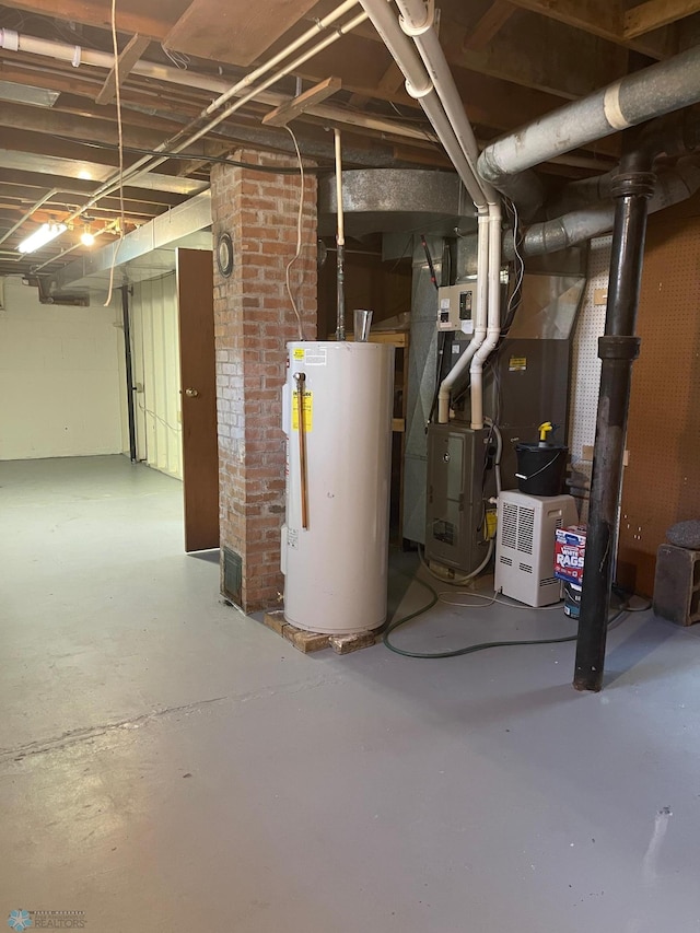 101 Oak St, Lisbon, ND 58054 - unfinished below grade area with water heater and heating unit