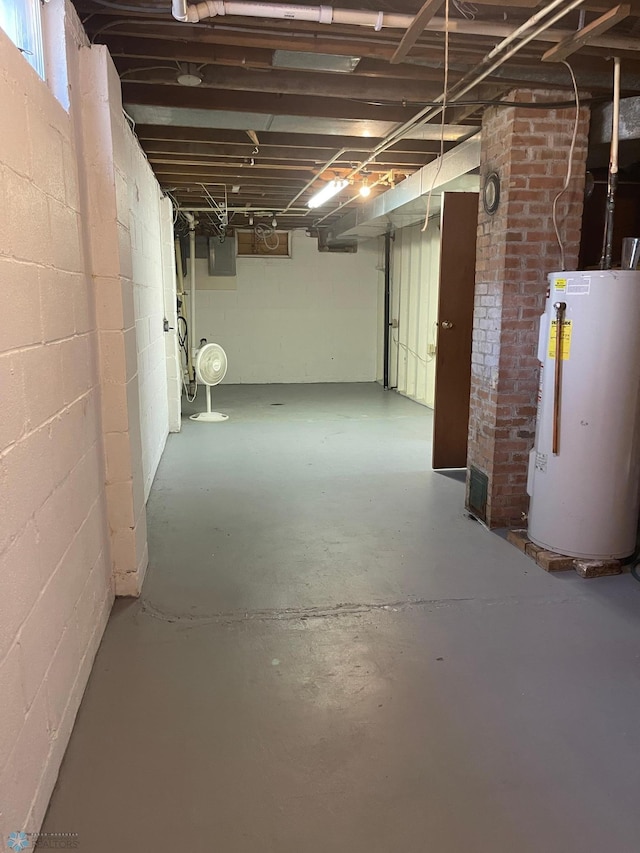 101 Oak St, Lisbon, ND 58054 - unfinished basement featuring water heater and electric panel