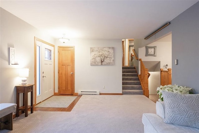 carpeted entryway featuring a baseboard heating unit, stairs, and baseboards