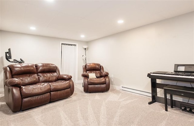 carpeted living area featuring recessed lighting, baseboards, and a baseboard heating unit