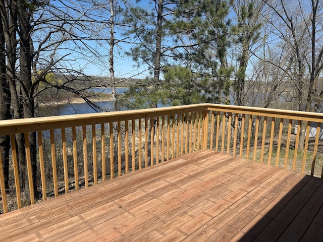 wooden terrace with a water view