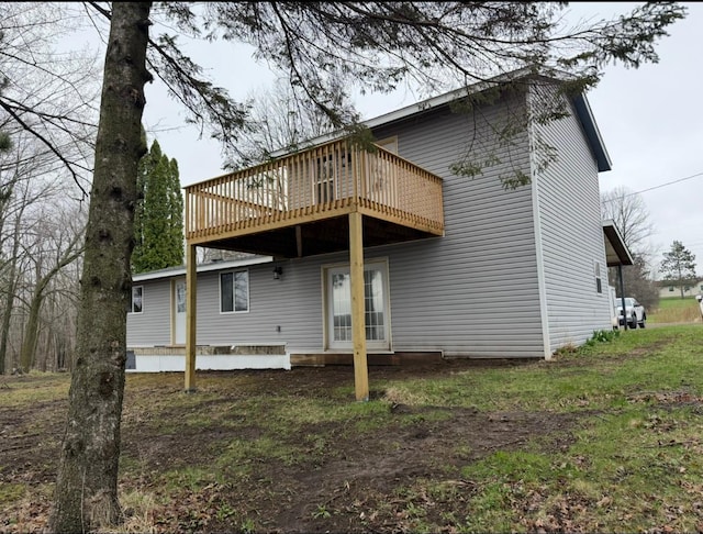 rear view of property with a deck