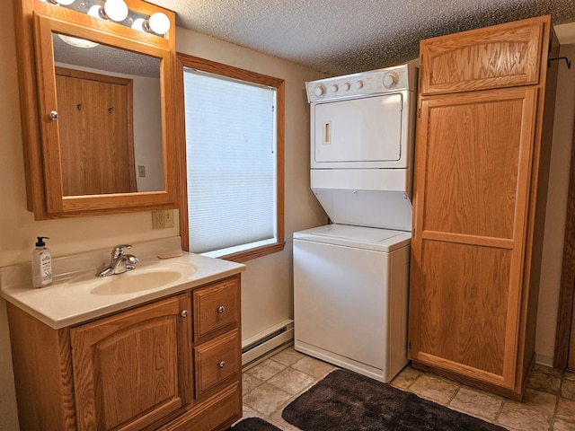 44948 Plentywood Rd, Perham, MN 56573 - washroom featuring stacked washer and clothes dryer, a baseboard heating unit, and a textured ceiling