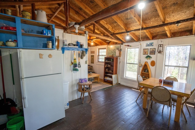 26159 County Road 345, Bigfork, MN 56628 - dining area featuring lofted ceiling with beams and hardwood / wood-style floors