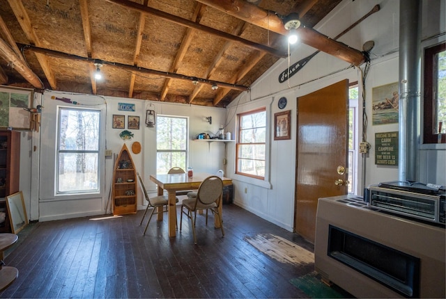 26159 County Road 345, Bigfork, MN 56628 - dining space with baseboards, lofted ceiling with beams, and dark wood finished floors