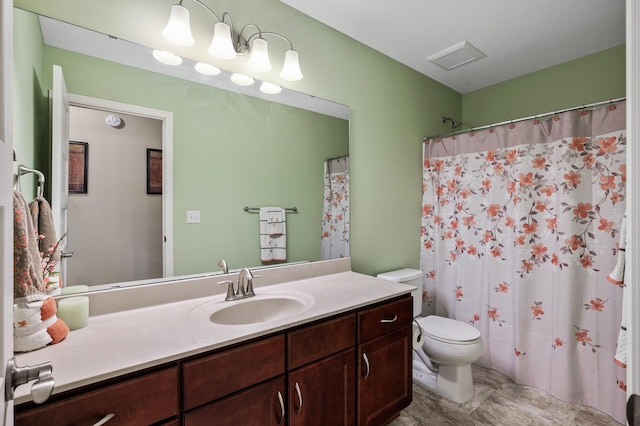 full bath featuring toilet and vanity
