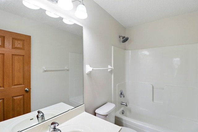 full bathroom with vanity, toilet, and bathtub / shower combination