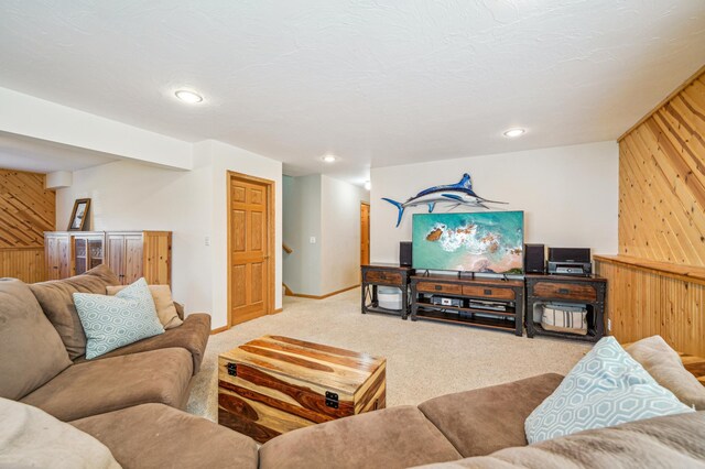 1036 Creekview Ln, Belle Plaine, MN 56011 - living area with carpet flooring, wooden walls, baseboards, and recessed lighting
