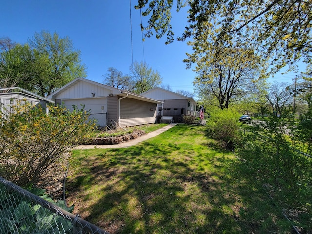 view of home's exterior featuring an outbuilding and an attached garage