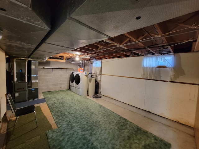 basement with independent washer and dryer and heating unit