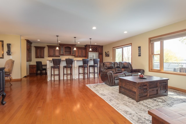 5123 Green Meadow Rd SE, Osakis, MN 56360 - living area featuring light wood-type flooring, baseboards, and recessed lighting