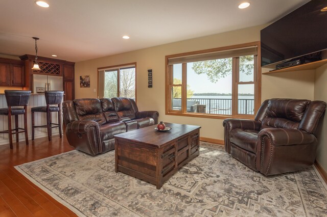 5123 Green Meadow Rd SE, Osakis, MN 56360 - living room featuring baseboards, light wood-type flooring, and recessed lighting