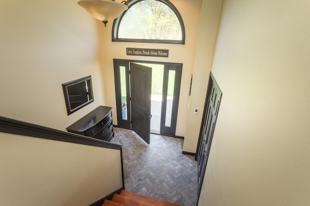 5123 Green Meadow Rd SE, Osakis, MN 56360 - entryway with a towering ceiling and baseboards