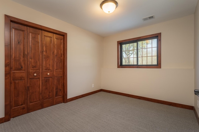5123 Green Meadow Rd SE, Osakis, MN 56360 - unfurnished bedroom featuring carpet flooring, visible vents, and baseboards