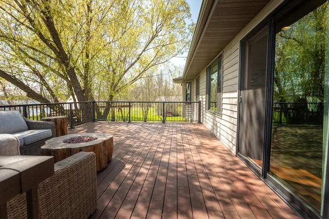 5123 Green Meadow Rd SE, Osakis, MN 56360 - deck featuring an outdoor fire pit