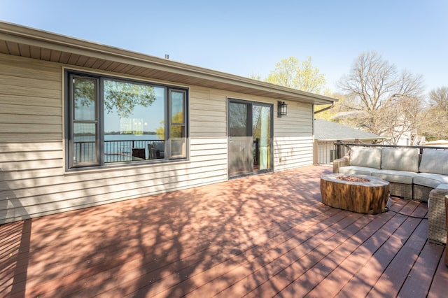 5123 Green Meadow Rd SE, Osakis, MN 56360 - deck featuring an outdoor living space with a fire pit