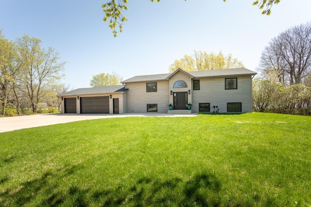5123 Green Meadow Rd SE, Osakis, MN 56360 - raised ranch featuring concrete driveway, an attached garage, and a front lawn