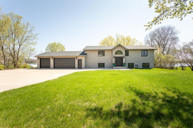 5123 Green Meadow Rd SE, Osakis, MN 56360 - split foyer home with driveway, a front lawn, and a garage